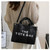 The tote bag black  The tote bag black