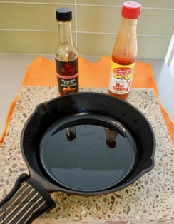 The hot skillet heated the oil and managed to stain or discolor most of the materials in the test.