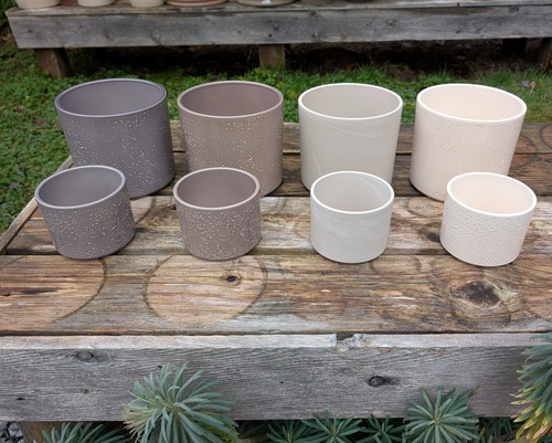"Discover the unique charm of our Pillar Lava Cylinder Pot, a sleek and modern planter inspired by natural volcanic textures. Perfect for indoor or outdoor use, this durable and stylish pot adds an earthy elegance to any space."
