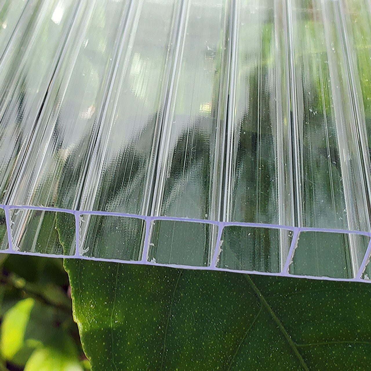 10mm TwinWall Polycarbonate Sheet 
7/16" thick, insulates and brings the light in