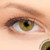 1 T Honey Contact Lenses shown on green eyes