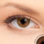 1 T Honey Contact Lenses shown on brown eyes
