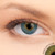 2 T Sky Blue Contact Lenses shown on green eyes