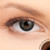 2 T Ebony Contact Lenses shown on brown eyes
