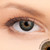 2 T Ebony Contact Lenses shown on grey eyes