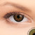 2 T Pure Hazel Contact Lenses shown on green eyes