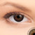 2 T Cocoa Contact Lenses shown on grey eyes