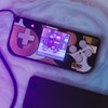 PicoSystem handheld running RP2040 game demo with illuminated 240×240 color display PicoSystem handheld running RP2040 game demo with illuminated 240×240 color display
