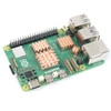 Copper heatsinks installed on Raspberry Pi 5 board for passive cooling