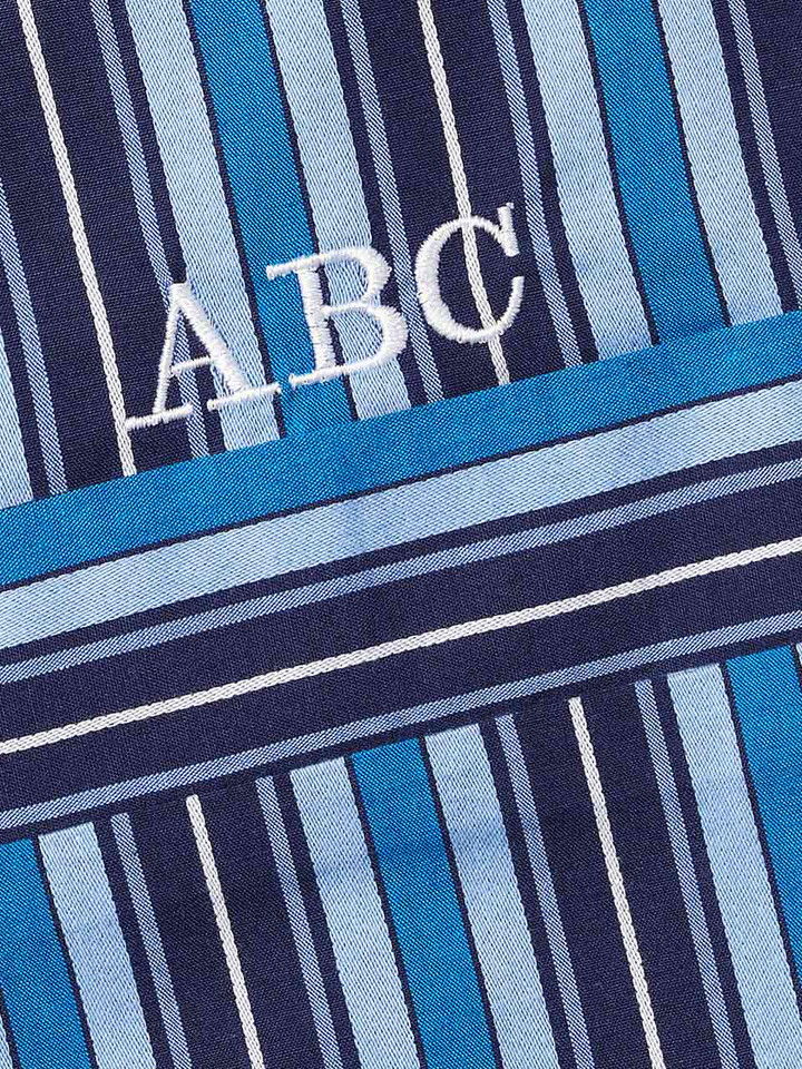 Close Up of Navy & Blue Club Striped cotton Pyjamas monogrammed