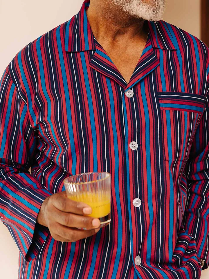 Model wears Mens Navy & Red Club Striped Cotton Pyjamas