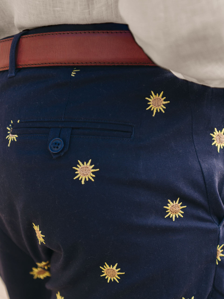 Mens Sun Embroidered Navy Cotton Pleated Shorts Closeup on Model