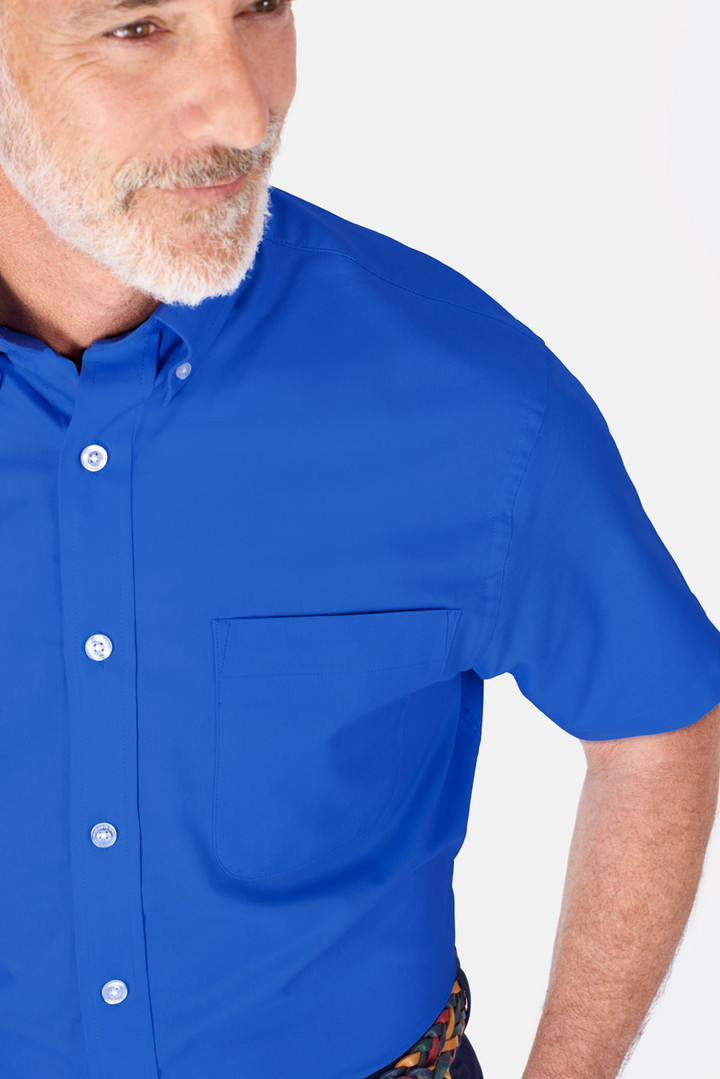 Model wears Men's Cobalt Blue Short Sleeve Oxford Shirt