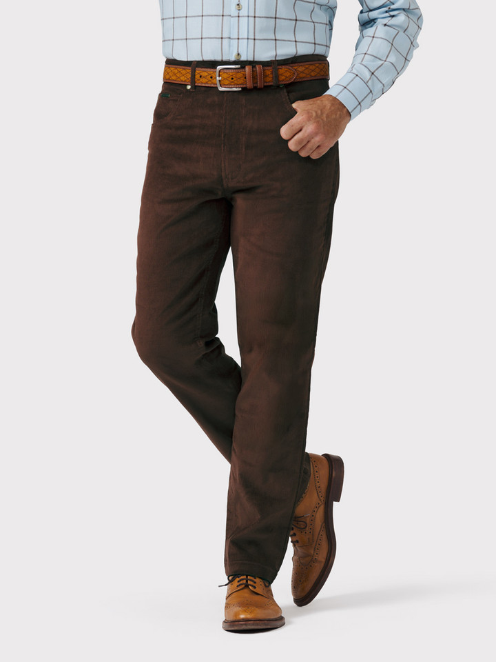 Model wears Mens Cocoa Needle Cord Jeans