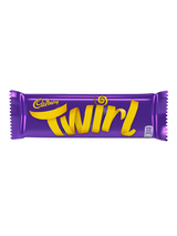 Twin fingers of milk chocolate over flaky swirls—rich texture and creamy indulgence.