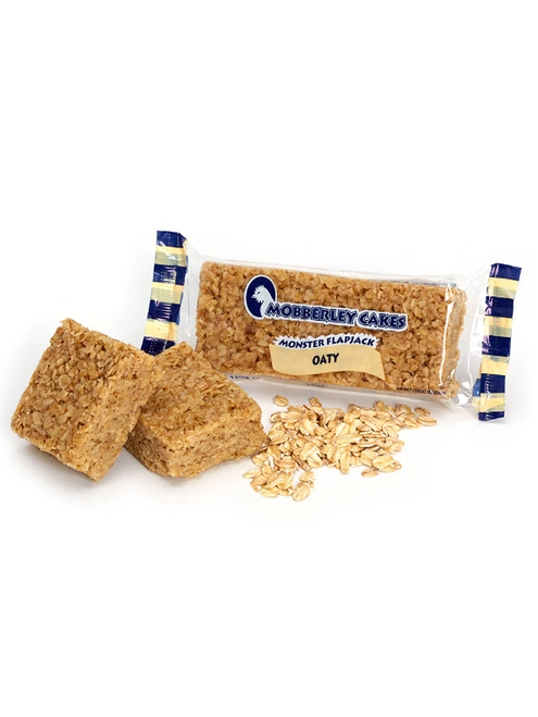 Supersized vegan oat flapjack—big on oat flavour, golden syrup sweetness, and perfect for energy boosts.