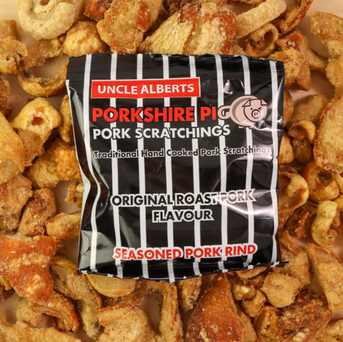 Uncle Albert’s Pork Scratchings 12 x 40g deliver bold, smoky, crunchy pork rind snacks. Perfect for pubs, parties, offices, or sharing at home. Uncle Albert’s Pork Scratchings 12 x 40g deliver bold, smoky, crunchy pork rind snacks. Perfect for pubs, parties, offices, or sharing at home.