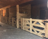 wooden gate in horse barn