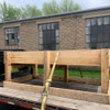 bunk feeder strapped down to trailer