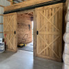 two sliding barn doors in board & batten