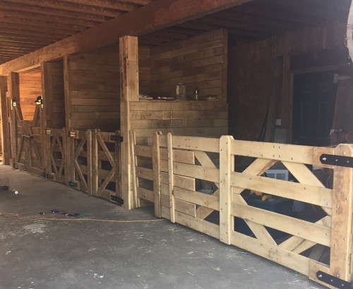 wooden gate in horse barn