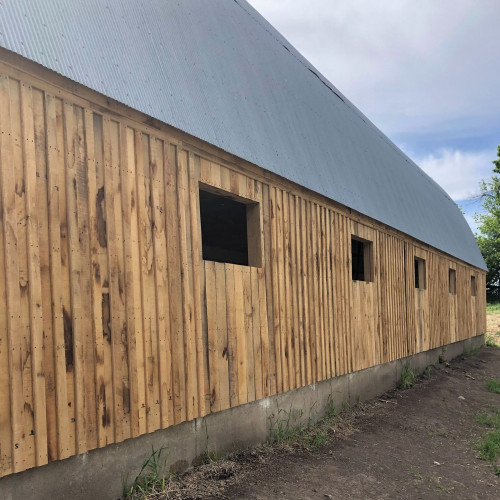 DIY board and badden wood siding on barn