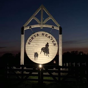 Round farm sign made of white oak lumber