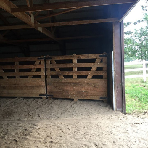 solid bottom panel attached to barn wall
