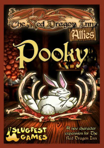 Board game box featuring game title and a white rabbit that has devoured a lot of food. Board game box featuring game title and a white rabbit that has devoured a lot of food.