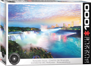 A Eurographics puzzle titled "Niagara Falls" that is an arial photo of Niagara Falls.  To the right are lit skyscrapers haloed in the light of twilight, and to the left is the majority of the falls themselves.  Spotlights shine down on the waters, and the colorful signs of the city mingles with the oranges and purples of the setting (or rising) sun to paint the water an array of yellows, pinks, and whites.  Behind the falls are patches of foliage colored lush green from their proximity to so much fresh water.