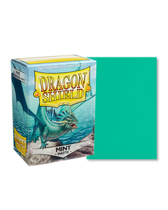 Dragon shield sleeve box featuring art of a small green dragon by the seaside. To the right of the box is a sample sleeve showcasing the bright mint sleeve color.
