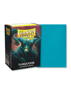 Dragon shield sleeve box featuring art of a turquoise colored dragon that looks similar to a lion with horns. To the right of the box is a sample sleeve showcasing the turquoise color on the sleeves. Dragon shield sleeve box featuring art of a turquoise colored dragon that looks similar to a lion with horns. To the right of the box is a sample sleeve showcasing the turquoise color on the sleeves.