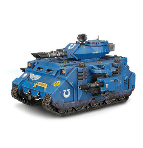 A fully painted blue Warhammer 40,000 Predator miniature.