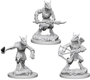 Three unpainted Kobold miniatures on a white background. Three unpainted Kobold miniatures on a white background.