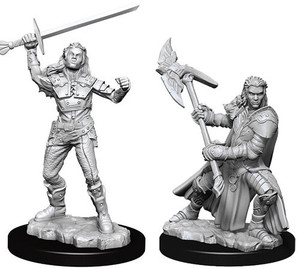 Two unpainted Female Half-Orc Fighter miniatures on a white background. The one on the left is wielding a sword and the one on the right is wielding an axe.