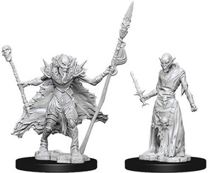 Two unpainted Ghoul miniatures on a white background.