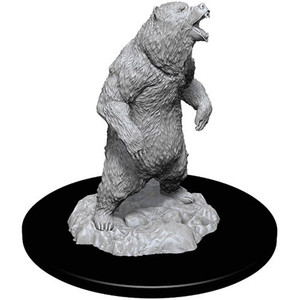 An unpainted Grizzly miniature standing on its hind legs on a white background. An unpainted Grizzly miniature standing on its hind legs on a white background.