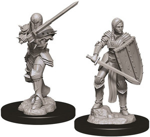 Two unpainted Female Human Fighter miniatures on a white background.