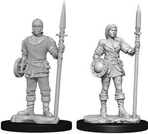Two unpainted Guard miniatures on a white background. The one on the left is the male miniature and the one on the right is the female miniature.