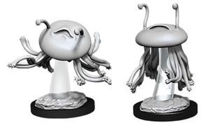 Two unpainted Flumph miniatures floating on a white background. The one on the left is slightly tilted down with its tentacles splayed out while the one on the right is upright.