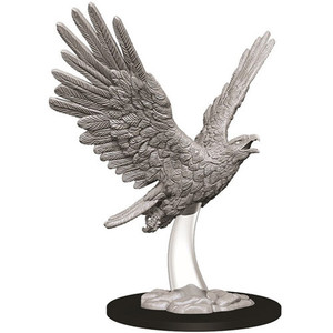 An unpainted giant eagle miniature in flight with a white background. An unpainted giant eagle miniature in flight with a white background.