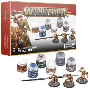 A Warhammer miniature and paint set titled "Warhammer - Age of Sigmar: Stormacast Eternals - Vindictors & Paint Set." Below a red stripe for the title and atop a white background is the photo of a set of six Citadel paints, a paintbrush, two miniatures in golden armor wielding shields and spears, and off to the left is a painted rendition of the depicted warriors. Below the box is a layout of all the items found within the kit as they appear on the front. A Warhammer miniature and paint set titled "Warhammer - Age of Sigmar: Stormacast Eternals - Vindictors & Paint Set." Below a red stripe for the title and atop a white background is the photo of a set of six Citadel paints, a paintbrush, two miniatures in golden armor wielding shields and spears, and off to the left is a painted rendition of the depicted warriors. Below the box is a layout of all the items found within the kit as they appear on the front.