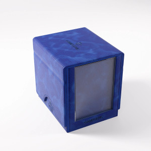 A cloth deck box in the color blue with a clear plastic window in the front for displaying cards. The Gamegenic logo is embossed on the top. A cloth deck box in the color blue with a clear plastic window in the front for displaying cards. The Gamegenic logo is embossed on the top.