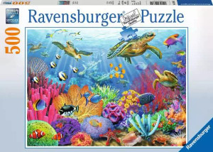 A puzzle with the words “Ravensburger Puzzle” at the top and the number ‘500’ along the left side of the white bordered cover.  Below is an image of the finished puzzle, which features a coral reef filled with small fish in the foreground and larger sea turtles swimming above.  Light beams down from the surface, coloring the water a bright blue-green.