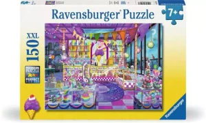 A puzzle with the words “Ravensburger Puzzle” at the top and the number ‘150’ along the left side of the white bordered cover.  Below is an image of the finished puzzle, which features a scene from an ice-cream shop that sells al sorts of rainbow frosted sweets.  Cakes sit in glass cases and the whole place is colored light purple and pink.  The ceiling and walls are  covered in dangling pegasi, rainbow banners, strings of light, and similarly glittery décor.