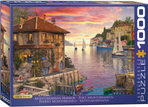 The image shows the box of a puzzle featuring the piece “Mediterranean Harbor” by Dominic Davison. The artwork depicts a picturesque Mediterranean harbor at sunset. The scene is vibrant, with the sky painted in rich hues of orange, pink, and purple, reflecting off the calm water. In the foreground, there is a stone building with a red-tiled roof, adorned with ivy and flowers, and warm light glowing from the windows. A set of stone steps leads down to a cobblestone path by the water. Small sailboats are gently floating on the harbor, with larger buildings visible along the shoreline in the background, framed by lush greenery. Along the right hand edge, the company logo reads "EUROGRAPHICS PUZZLES" in white text on blue background and the number ‘1000’ after it indicates the puzzle piece count. Along the bottom edge the title is printed in several different languages. The image shows the box of a puzzle featuring the piece “Mediterranean Harbor” by Dominic Davison. The artwork depicts a picturesque Mediterranean harbor at sunset. The scene is vibrant, with the sky painted in rich hues of orange, pink, and purple, reflecting off the calm water. In the foreground, there is a stone building with a red-tiled roof, adorned with ivy and flowers, and warm light glowing from the windows. A set of stone steps leads down to a cobblestone path by the water. Small sailboats are gently floating on the harbor, with larger buildings visible along the shoreline in the background, framed by lush greenery. Along the right hand edge, the company logo reads "EUROGRAPHICS PUZZLES" in white text on blue background and the number ‘1000’ after it indicates the puzzle piece count. Along the bottom edge the title is printed in several different languages.