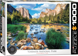 The image depicts a lush landscape with a foreground of moss-covered rocks and tall grass along a tranquil river. The river reflects the vibrant blue sky and the warm, golden hues of the late afternoon sun. Tall pine trees line the riverbank, leading to towering granite cliffs in the background under a partly cloudy sky. The title, "Yosemite National Park, California, USA" is printed along the bottom edge. Along the right hand edge, the company logo read "EUROGRAPHICS PUZZLES" in white text on a black background. The number ‘1000’ after it indicates the puzzle piece count. In the bottom left, there is a picture of a camera lens with the words "HDR Photography - Scenic Landscape" printed on the inside rim of the lens. The image depicts a lush landscape with a foreground of moss-covered rocks and tall grass along a tranquil river. The river reflects the vibrant blue sky and the warm, golden hues of the late afternoon sun. Tall pine trees line the riverbank, leading to towering granite cliffs in the background under a partly cloudy sky. The title, "Yosemite National Park, California, USA" is printed along the bottom edge. Along the right hand edge, the company logo read "EUROGRAPHICS PUZZLES" in white text on a black background. The number ‘1000’ after it indicates the puzzle piece count. In the bottom left, there is a picture of a camera lens with the words "HDR Photography - Scenic Landscape" printed on the inside rim of the lens.
