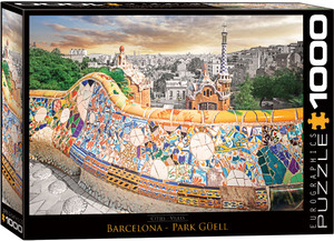 The image depicts a vibrant and colorful view of Park Güell in Barcelona. The foreground displays the iconic serpentine bench adorned with intricate mosaics in a myriad of colors, including blues, greens, reds, and yellows. The bench curves around the terrace, providing a prominent abstract and artistic feature. In the background, several of Gaudí's architectural structures are visible, characterized by their unique shapes and mosaic details. The cityscape of Barcelona extends into the distance, under a partly cloudy sky that glows with warm hues as if illuminated by the setting sun. The perspective of the image captures the artistic and architectural essence of the park, highlighting the fusion of nature and design. The title, "New York City - Yellow Cab" is printed in yellow on black background along the bottom edge. Along the right edge, the company logo reads "EUROGRAPHICS PUZZLES" and the number ‘1000’ after it indicates the puzzle piece count. The image depicts a vibrant and colorful view of Park Güell in Barcelona. The foreground displays the iconic serpentine bench adorned with intricate mosaics in a myriad of colors, including blues, greens, reds, and yellows. The bench curves around the terrace, providing a prominent abstract and artistic feature. In the background, several of Gaudí's architectural structures are visible, characterized by their unique shapes and mosaic details. The cityscape of Barcelona extends into the distance, under a partly cloudy sky that glows with warm hues as if illuminated by the setting sun. The perspective of the image captures the artistic and architectural essence of the park, highlighting the fusion of nature and design. The title, "New York City - Yellow Cab" is printed in yellow on black background along the bottom edge. Along the right edge, the company logo reads "EUROGRAPHICS PUZZLES" and the number ‘1000’ after it indicates the puzzle piece count.