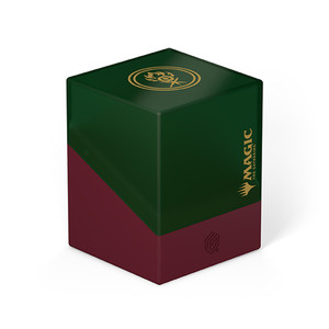 A card deck box with a semi-transparent dark green upper half with a satin finish, a solid red lower half, a golden emblem featuring a fiery orb and crossed lines on top, and Magic: The Gathering’s logo along the front right side. A card deck box with a semi-transparent dark green upper half with a satin finish, a solid red lower half, a golden emblem featuring a fiery orb and crossed lines on top, and Magic: The Gathering’s logo along the front right side.