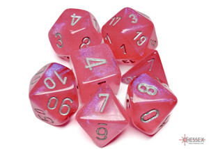 A set of 7 polyhedral dice with differing numbers of sides in the color light pink with silver numerals.